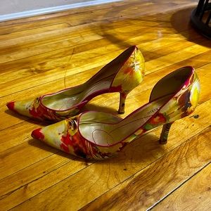 Used shoes. Satin material with a floral print